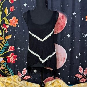 Black Sleeveless Top with White Lace Accents